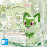 Bandai Sprigatito Pokémon Model Kit QUICK 18 box and assembled figure on a green glass-themed display
